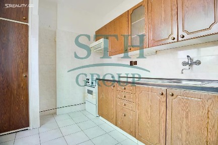 Unhošť, Kladno, Komenského